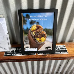a picture of a person holding a burrito