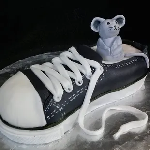 a shoe with a mouse on top