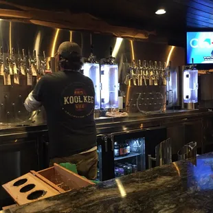 a man working at a bar