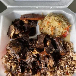 Oxtail with rice beans and cabbage