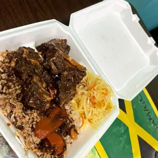 a meal in a styrofoam container