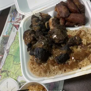 Jerk Pork, plantains, rice, and mac n cheese