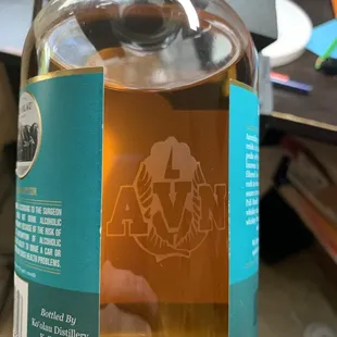 Custom hand etched bottles available for an additional cost. Hand painted by Heather, one of the partners.