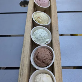 From top to bottom: rose, koolfi, tulsi, vegan dark chocolate, and jackfruit/coconut.