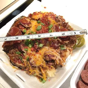 a plate of food with a measuring tape