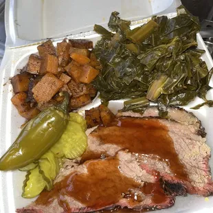 meat and vegetables in a styrofoam container