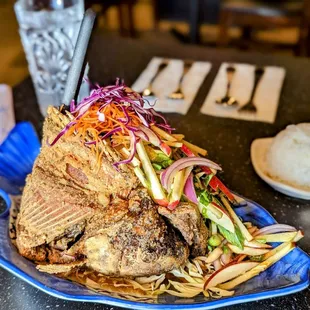 Yum Pla Tod (deep fried fish with house sauce, apple slices, peanuts, and veggies): (4.3/5)