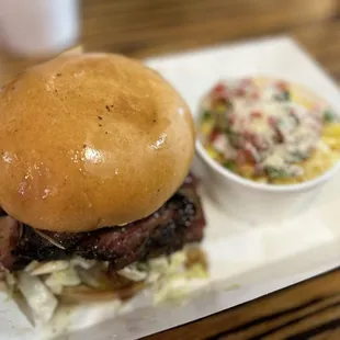 Sliced Brisket on Brioche Bun with Spicy Jalapeno cream Corn