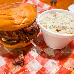 Sliced brisket sandwich &amp; potato salad
