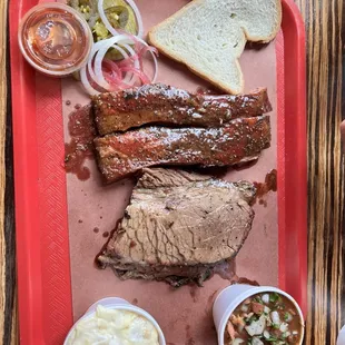 2 meat plate with brisket and pork ribs. Brisket beans and banana pudding on the side!