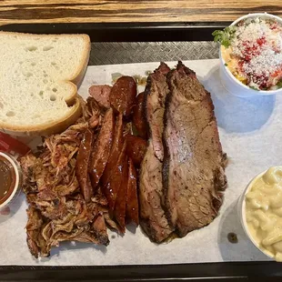 3 meat platter with corn and mac n cheese.