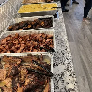 Brisket, sausage, chicken, their AMAZING broccoli cheese casserole, brisket beans &amp; green beans.