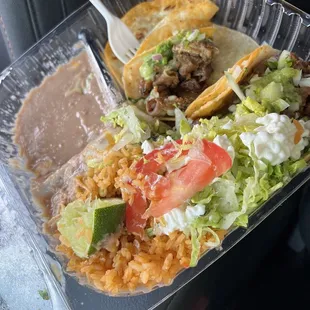 Tacos de Tripa y arroz con frijoles