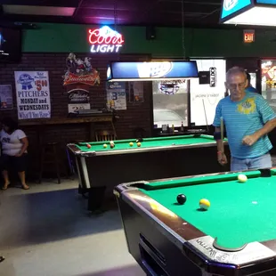 a man playing pool