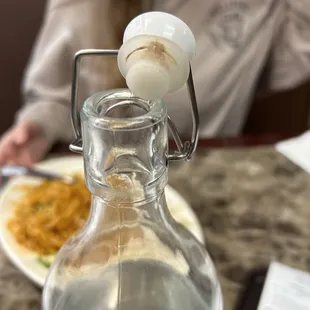 bottled water, mildew residue? not cleaned