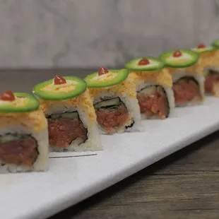 a row of sushi rolls