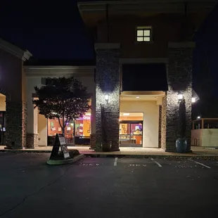 Exterior from the parking lot, with lots of parking available