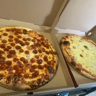 Pepperoni and cheese pizzas