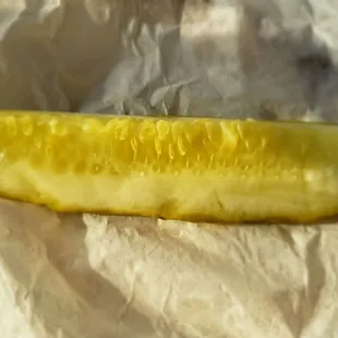 The pickle with the panini.