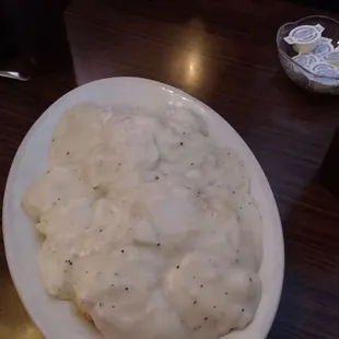 2 biscuits with sawmill gravy is $4.25 as of 12/2/23