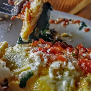 a plate of food with a fork in it