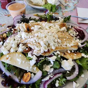 Grilled chicken with fresh pear and goat cheese with a homemade vinaigrette.