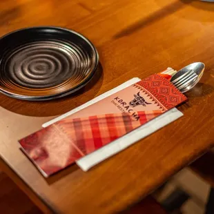a fork and spoon on a table