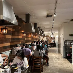 diners sitting at tables in a restaurant