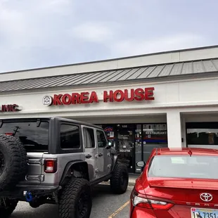 a jeep parked in front of the store