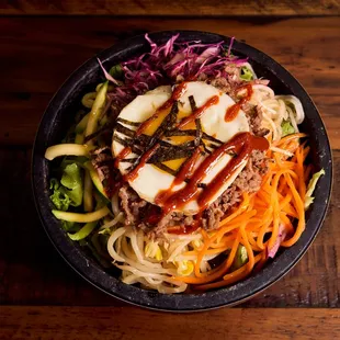 a bowl of asian food