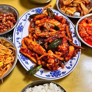 a variety of dishes of food on a table