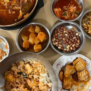 a variety of dishes of food on a table