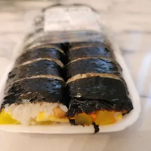 a sushi roll on a plate
