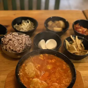 Spicy silken tofu soup w/ dumpling. So good!