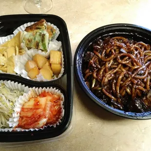 Take out: black bean noodles and side. Delicious!