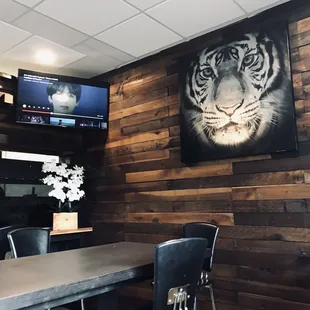 Inside has one long table and two small tables by the window