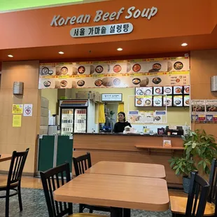 That is the owner of this korean beef soup restaurant