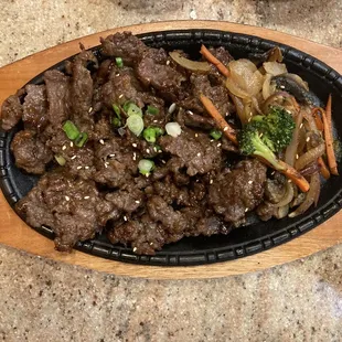 Bulgogi, egg rolls, side dishes