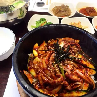 The one in front of me is a octopus w/ the hot Korean sauce and hot stone plate. I forgot the name but it was great! :)