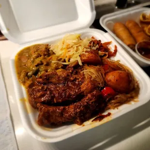 a meal in a styrofoam container
