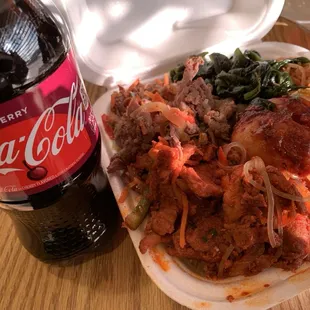 Combo#2- Beef &amp; spicy bulgogi w/double greens topping white rice, and noodles and potatoes. Comes with crab rangoon and egg roll. Coke drink