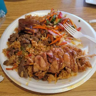 Fried rice,  chicken skewer, beef bulgogi, galbi, rainbow salad. We already started eating before I took this photo. It was all delicious!