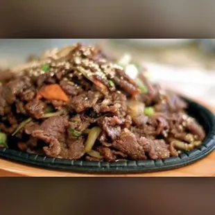 Bulgogi - thin sliced beef ribeye marinated with homemade Kbbq sauce with veggies