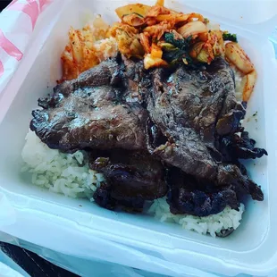 a meal in a styrofoam container