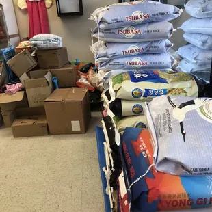 a large pile of clothing and boxes