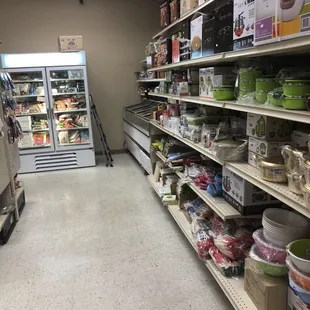 a grocery aisle with a variety of food items