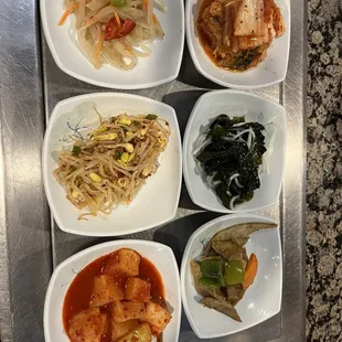 a variety of dishes of food