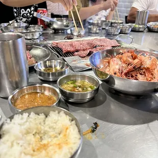 a group of people preparing food