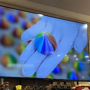 Cool videos playing of interesting places in Korea - this was a bakery called Sugar Bean making rainbow pastries