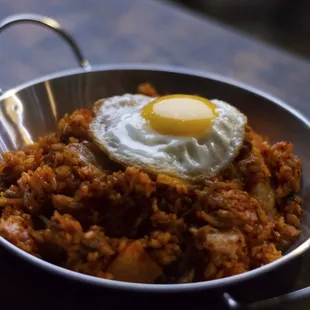 a fried egg in a bowl